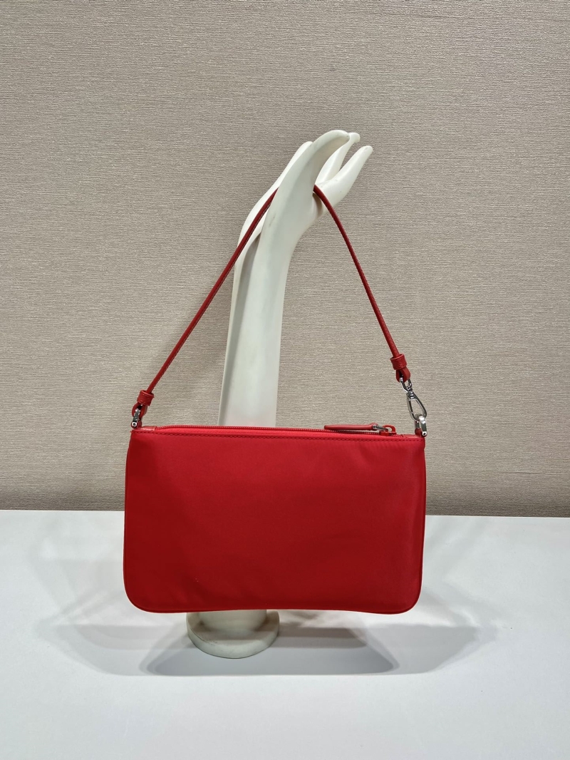 Pra*a clutch bags